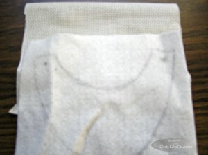 tacking felt to the aida fabric