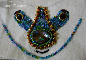 finding I need to over stitch between each bead after backstitching. Guess I will be using the 2 needle technique from here on